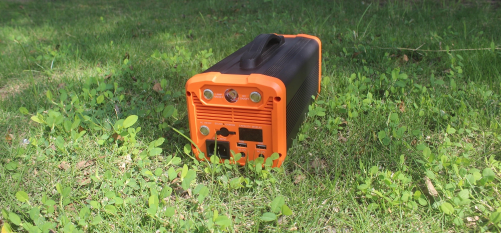 MP-300 Portable Power Station in the green field outdoor